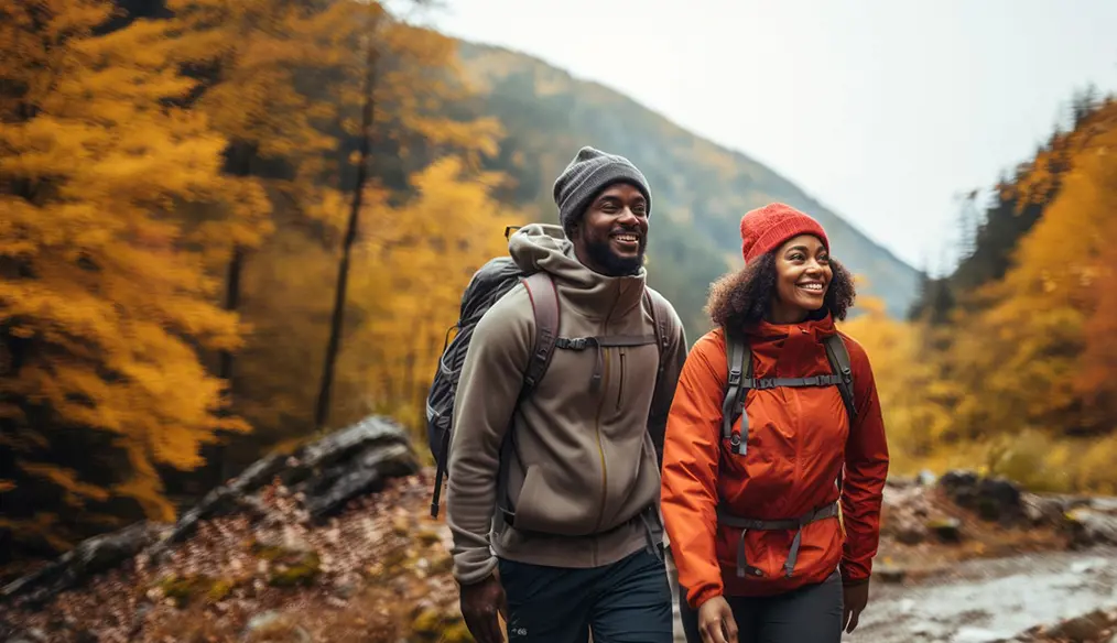 two people hiking in the woods