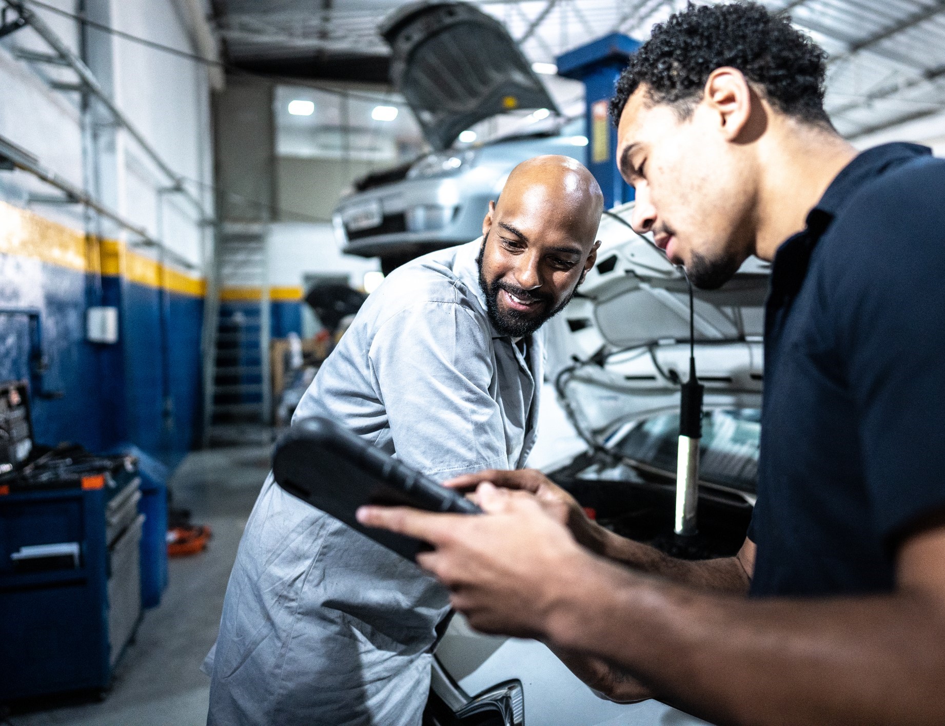 smiling older couple with foreheads together