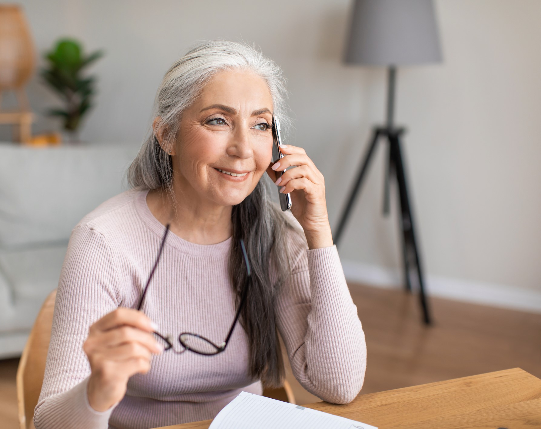 mature woman talking on cellphone